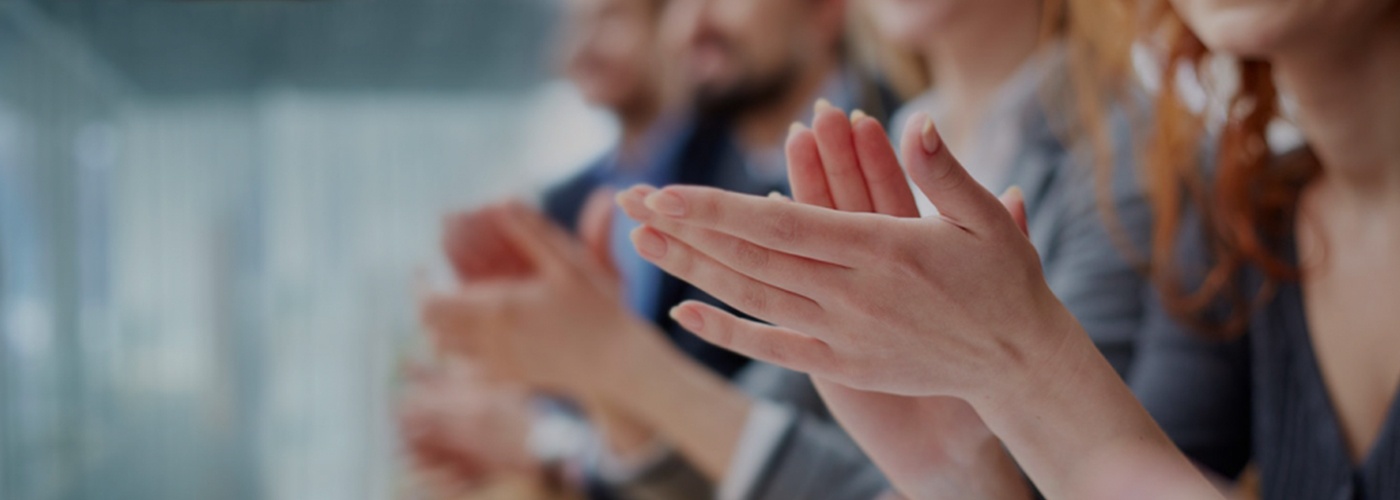 MICE Excellence Image banner of participants in MICE clapping and encouraging for the excellence