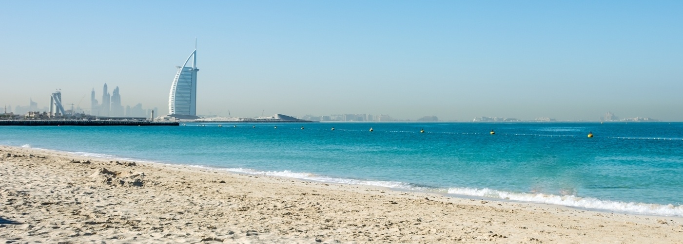 Burj al Arab & Sea Shore Image banner of Burj al Arab a luxury hotel located in the city of Dubai near sea shore