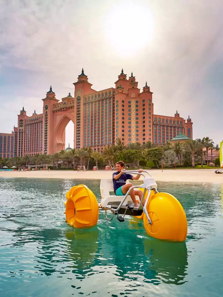 Hotel Atlantis and tourist enjoying in the beach - Dubai Tour Package