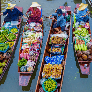 Damnoen Saduak Floating Market with wooden boats near Bangkok