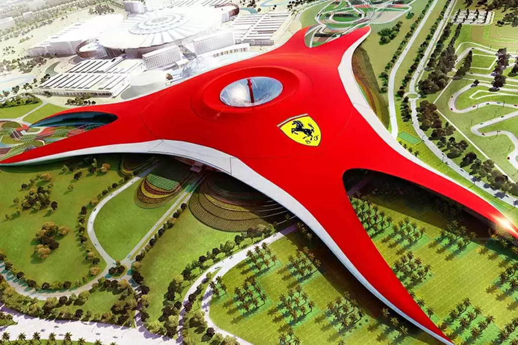 Ferrari World Abu Dhabi theme park with red roof structure and roller coasters