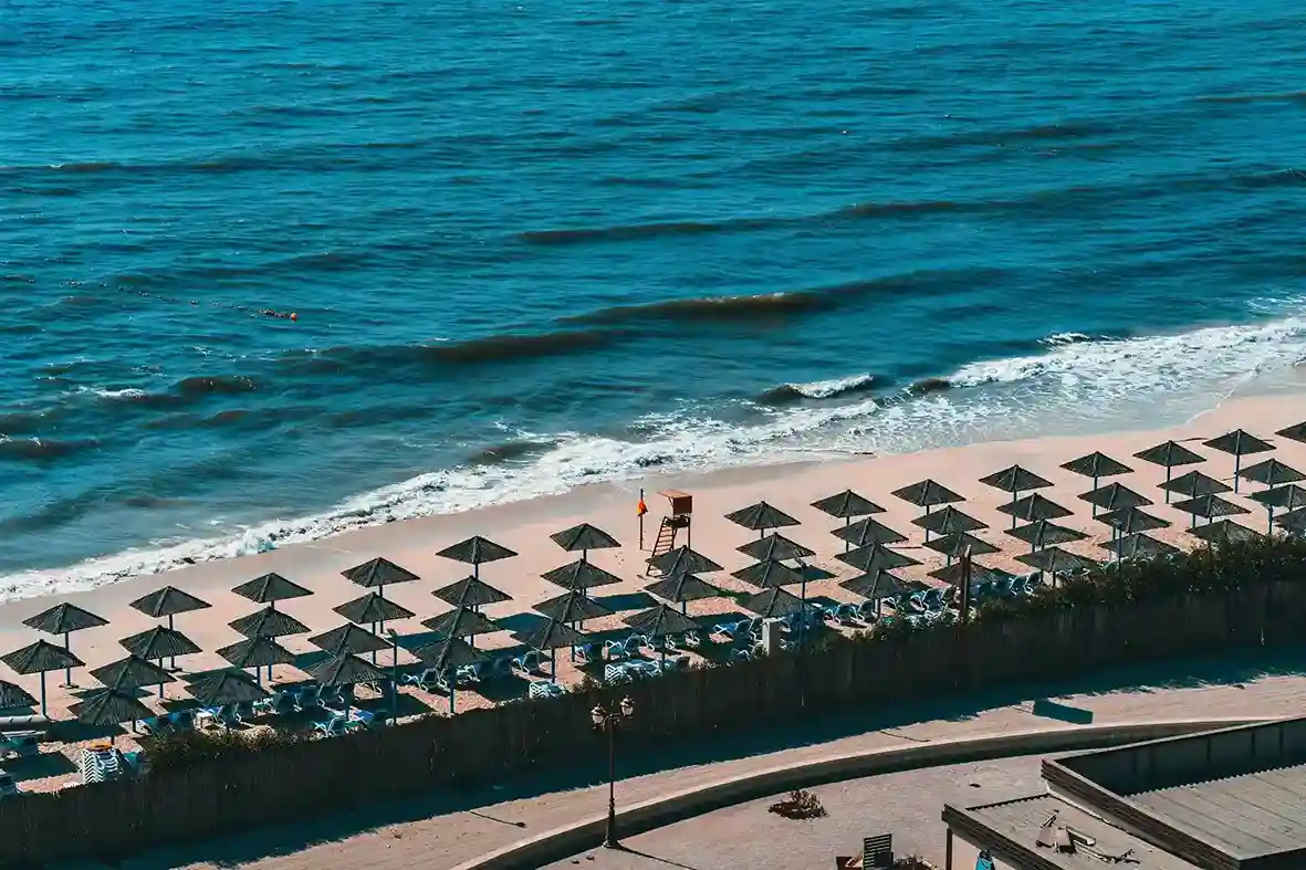 Ajman coastline with beach resorts and calm Arabian Gulf waters
