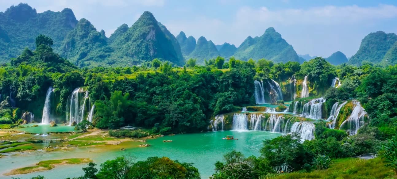 Scenic view of Vietnam featuring waterfalls, tropical landscapes, and natural beauty