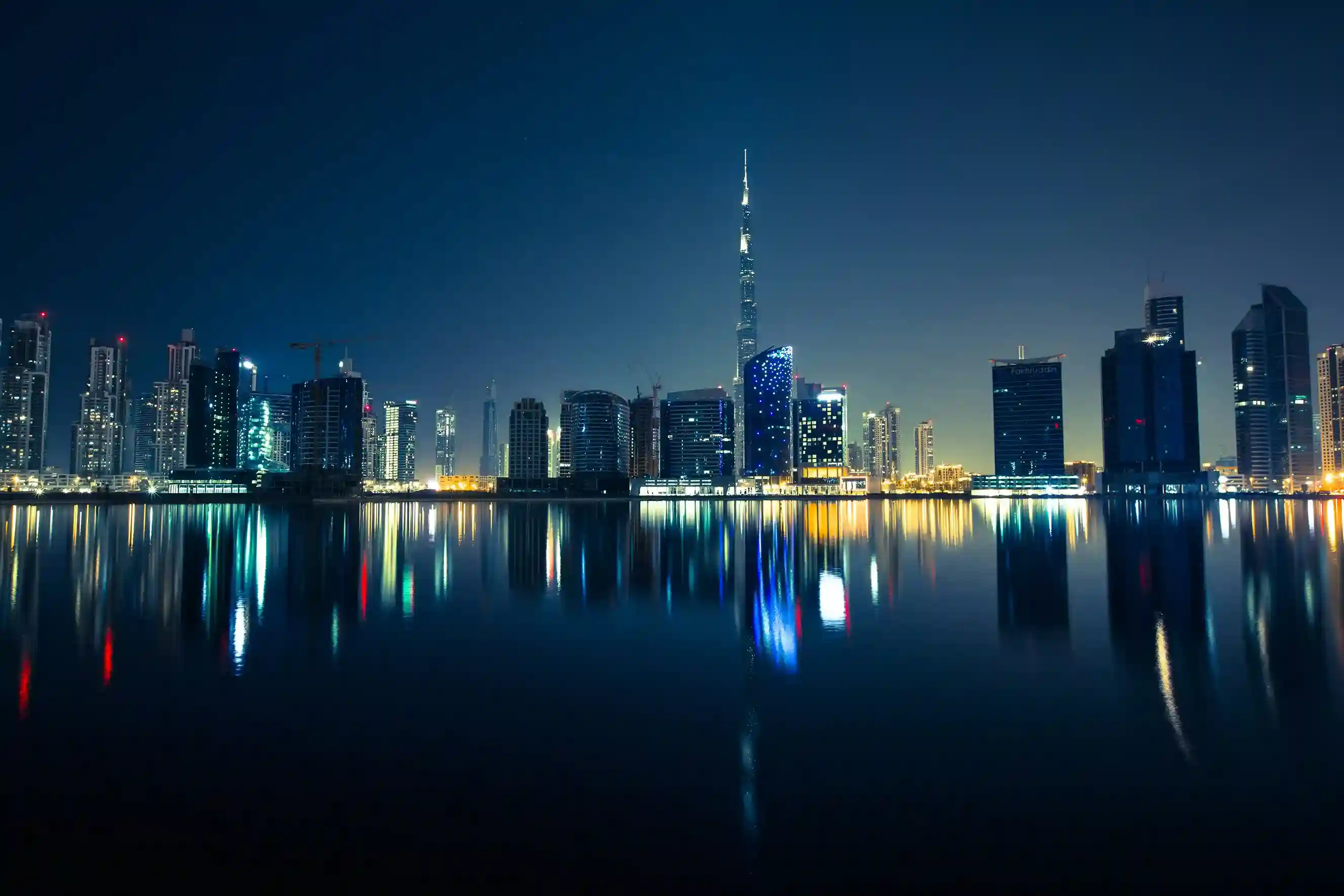 UAE skyline with modern skyscrapers and desert landscape showcasing luxury travel and destination management services in Dubai and the UAE