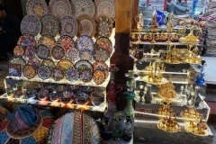 Image of Dubai Spice Market in UAE with Cutlery, utensils, chandeliers, pashmina, rugs, artefacts and jewelry