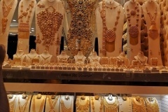 Image of gold, silver, diamonds & precious metals & stones showroom display of jewelry kept for sale in Dubai's Gold Souk market