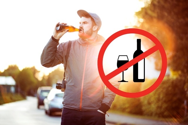 Image of man drinking or alcohol consumption which is banned in public in UAE