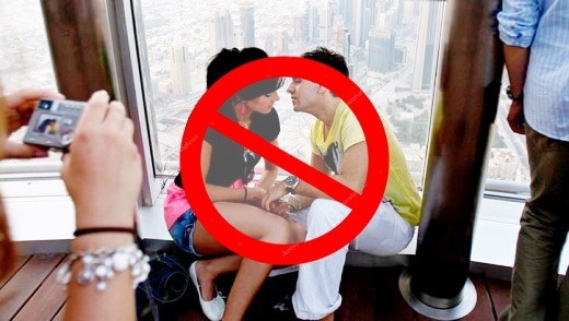 Image of young couple in romance which is banned in public in UAE