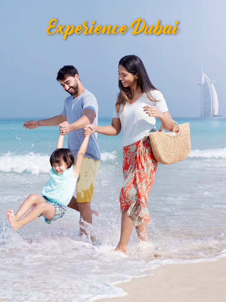 Family enjoying in UAE beach and 7 star hotel Burj Al Arab - Dubai tour package