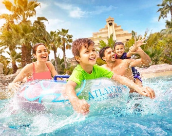 Tourist family enjoying Atlantis-Aquaventure water park in UAE