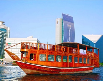 A beautiful view of Dhow-Cruise with tourist around the city in the Arabian water
